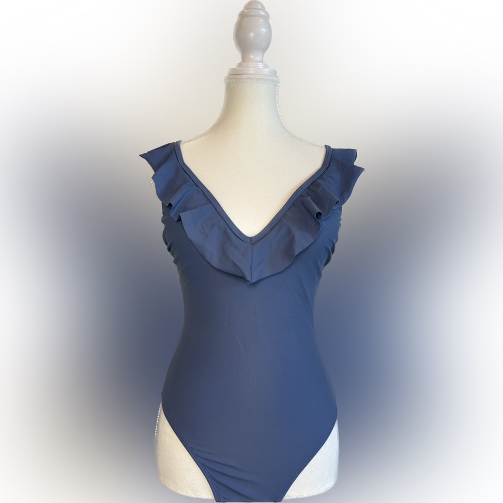 Xhilaration blue ruffled v-neck one piece swimsuit. Size M.